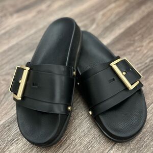 All Saints Black Leather Slide Sandals with Gold Buckle